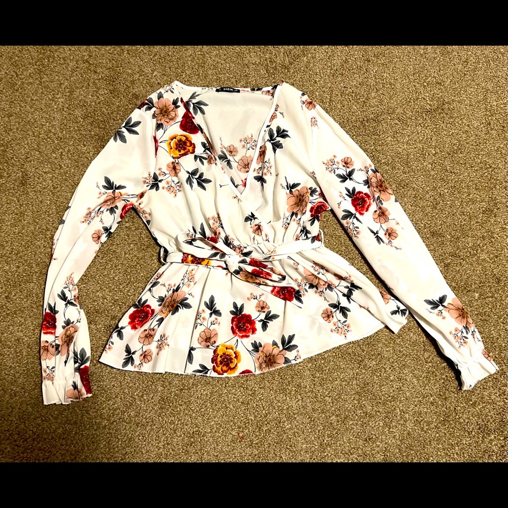 White floral blouse that ties at the waist with cute flare sleeves